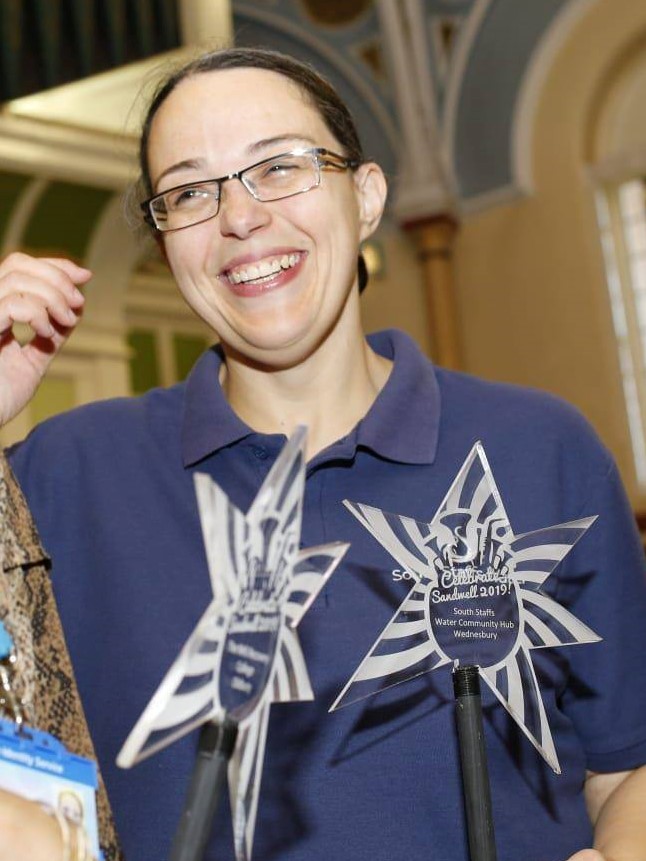 Photo of Hub advisor, Becky, with the award