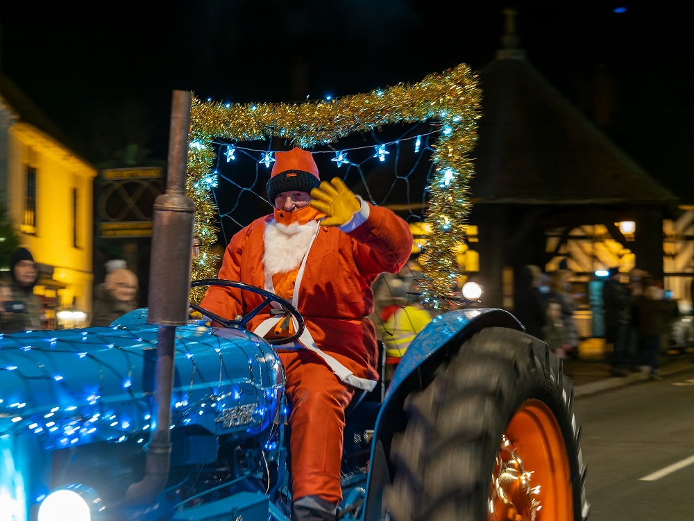 Photo of a Santa driving a tractor