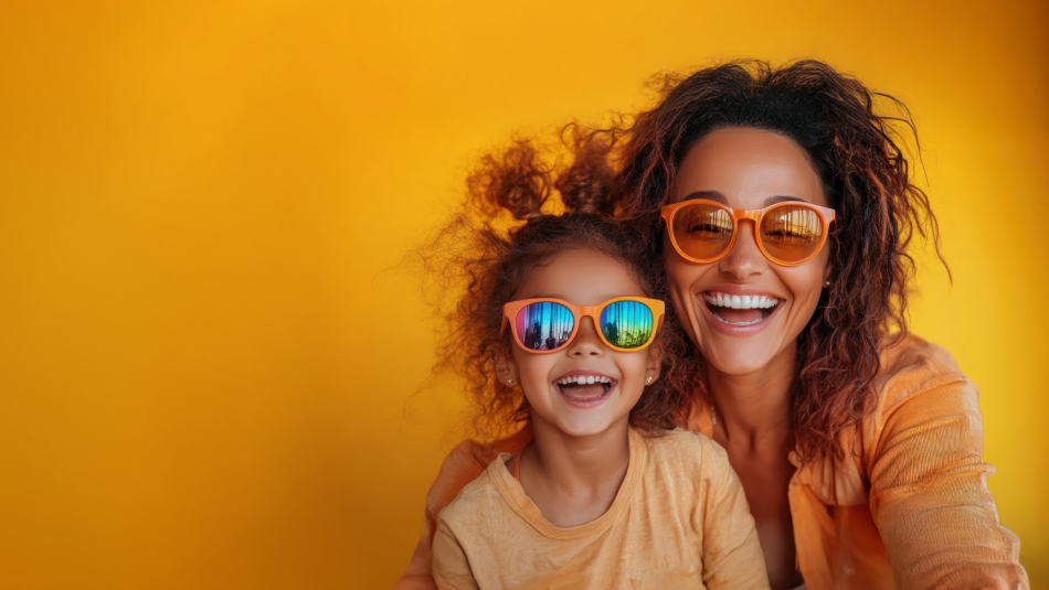 Mother and daughter wearing sunglasses