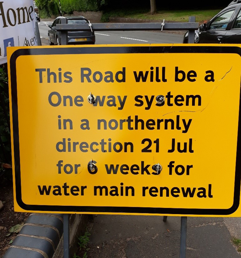 Photo of road sign stating road will be a one-way system